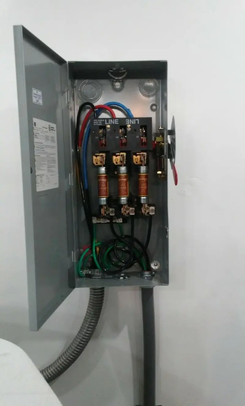 Three-phase disconnect switch installed for Smoke Detector Installation in Golden Beach